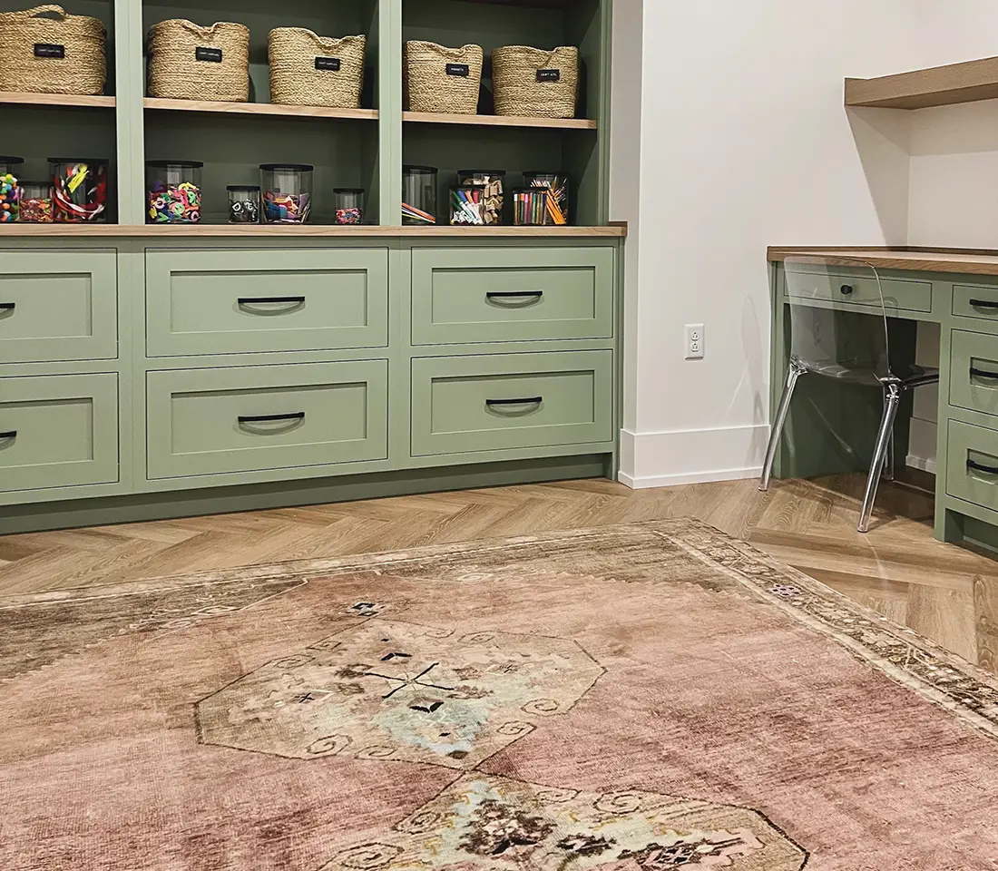Office design with modern floor rug by Kate Irmen Interiors in Bloomington IL